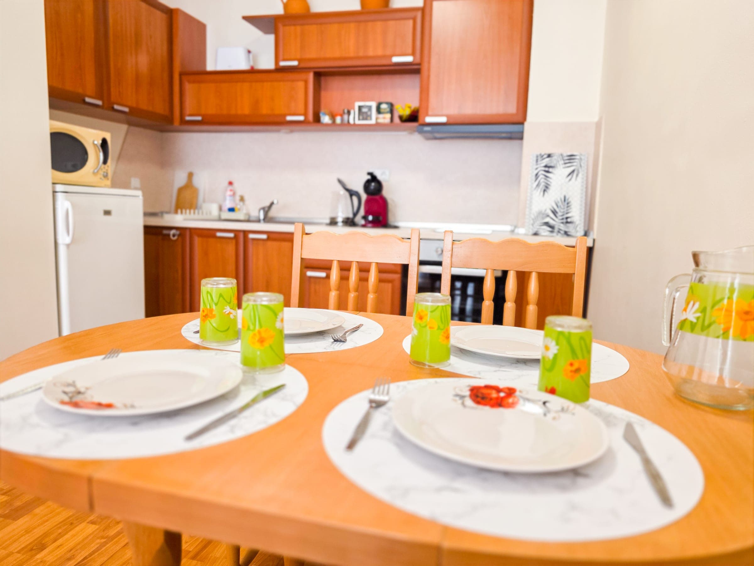Cozy eat-in kitchen with dining table set for four